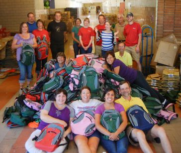 Packing backpacks for Schoolhouse Supplies